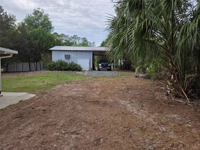 Driveway to carport and work shop