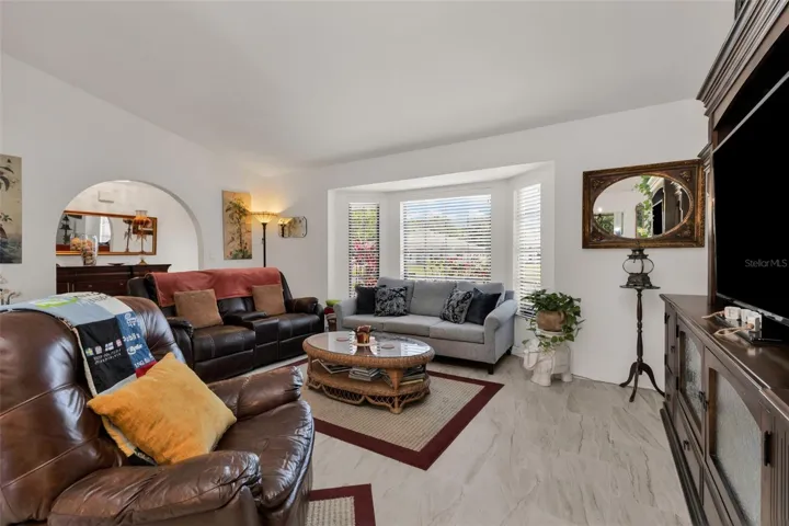 SPACIOUS LIVING ROOM GORGEOUS NEW TILE