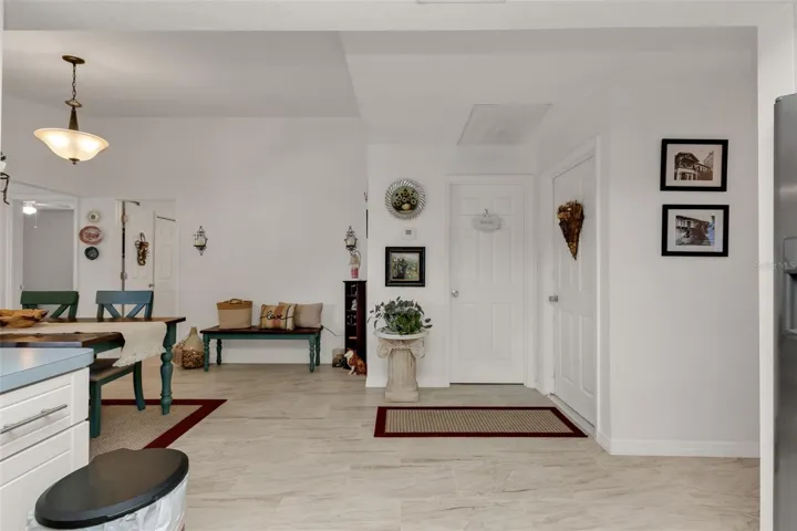 DOORS TO LAUNDTRY ROOM AND TO GARAGE ON RIGHT