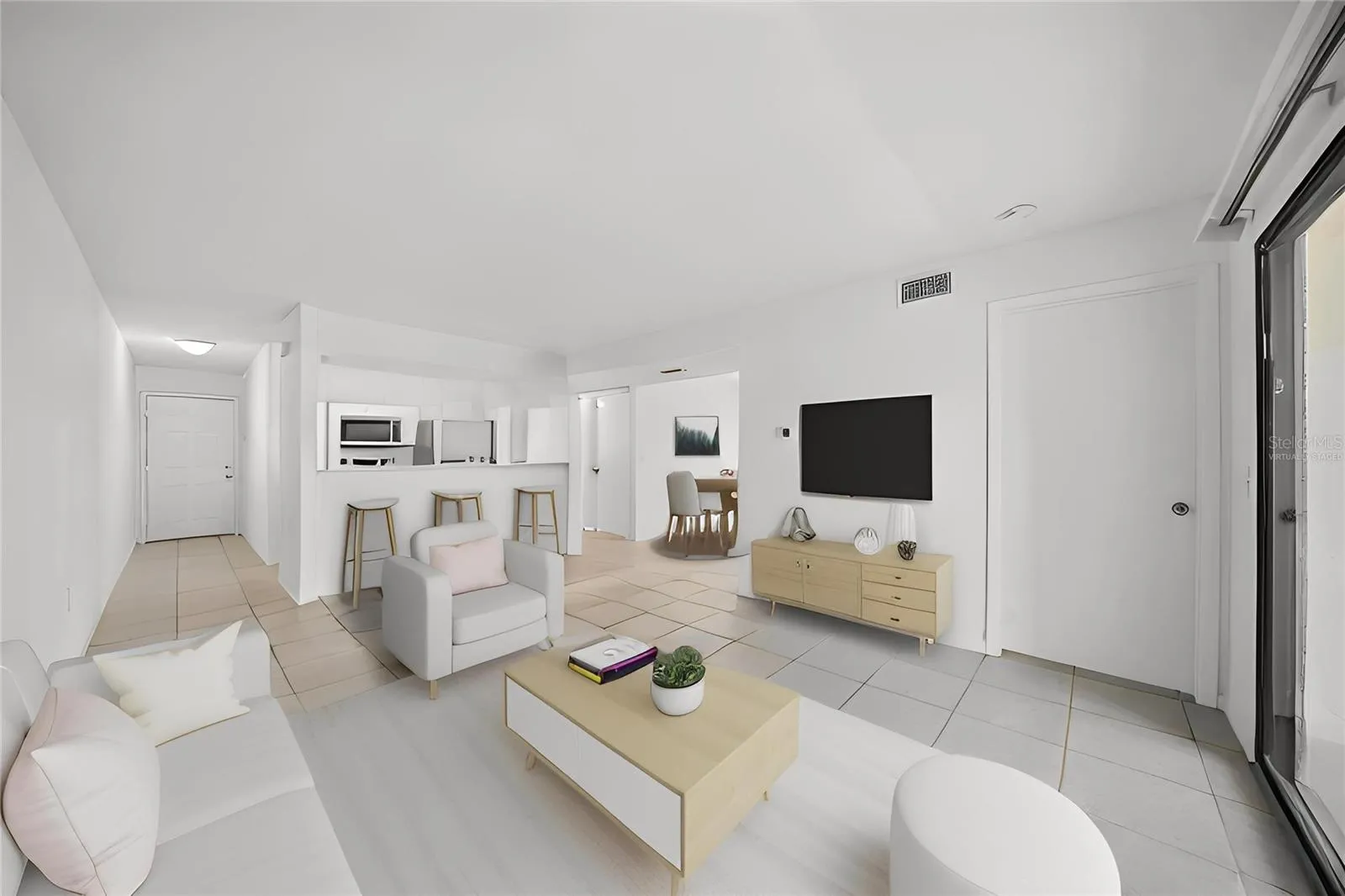 Living Room towards kitchen and dining room-virtually staged