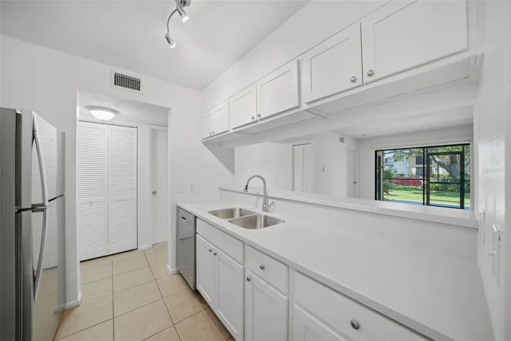 New updated kitchen with solid surface counters