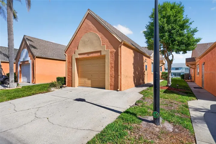 Enter the villa through the garage, or a side door.