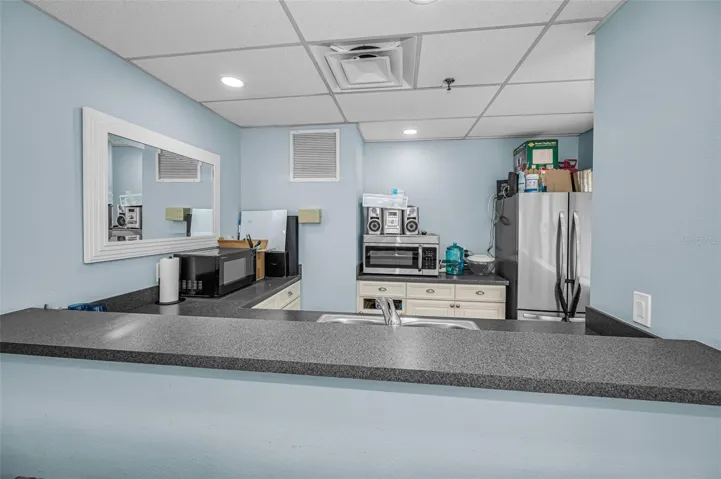 community entertainment room kitchen