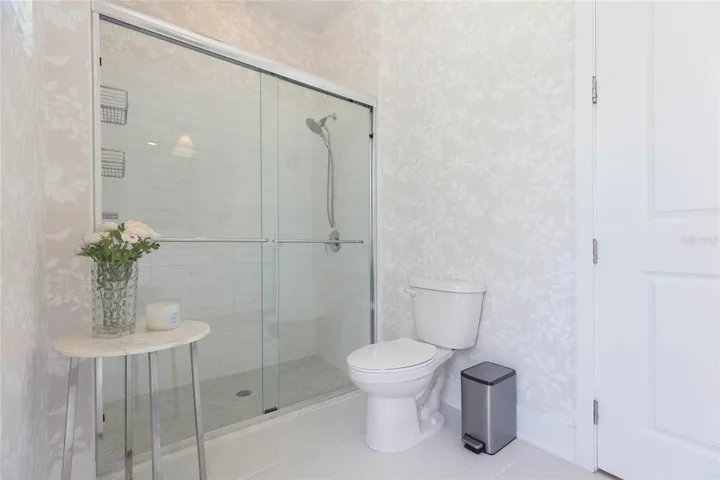 First Floor Bathroom w Access to Pool