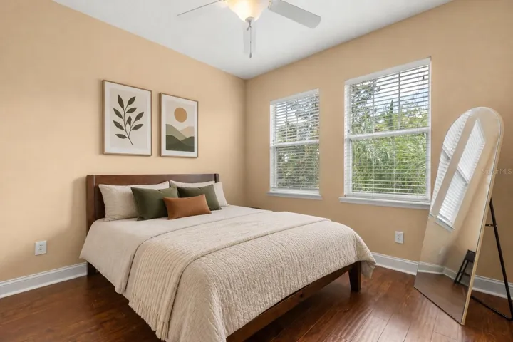 Bright third bedroom filled with natural light, perfect for a bedroom, office, or flex space.