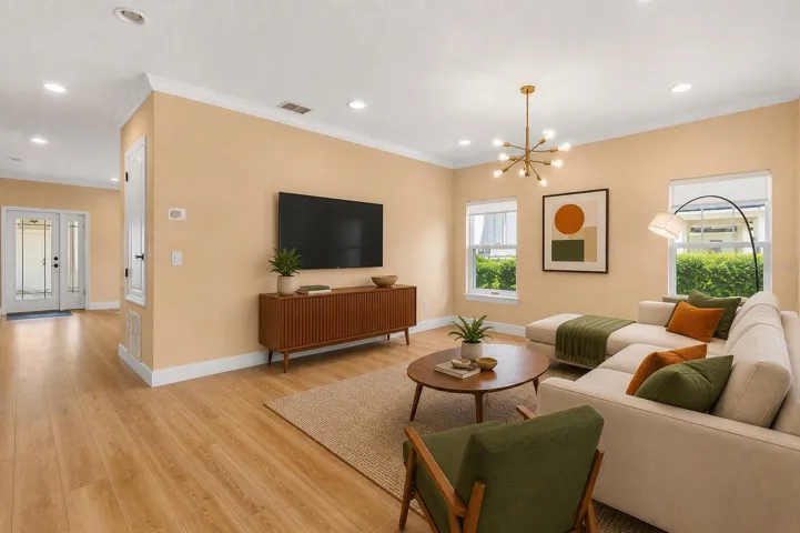 Inviting open-concept living area offering natural light, clean lines, and a warm, welcoming feel.