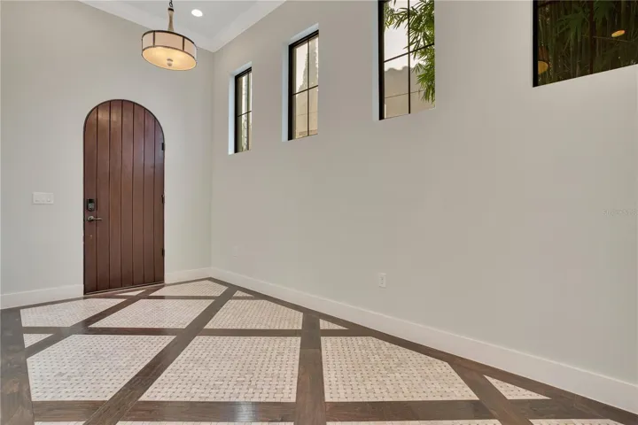 Foyer has wood & Basket Weave Marble