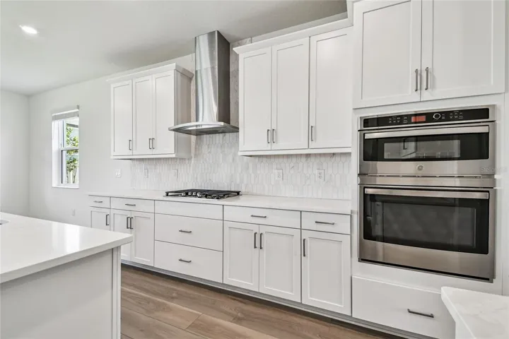 Kitchen with gas, range hood, 7579 Seahawk Ave. Sarasota, FL 34241 Hawkstone