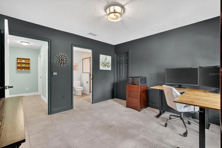 Second bedroom with pocket door to adjoining bathroom
