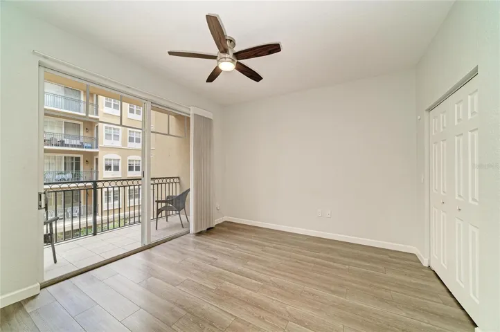 Master Bedroom With Balcony View