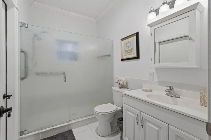 THIS IS THE PRIVATE 3RD BEDROOM'S BATH WITH A WALK IN SHOWER