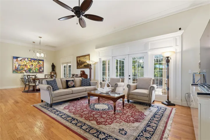 THIS FAMILY ROOM EXPANDS INTO THE OUTSIDE AREA WITH FRENCH DOORS