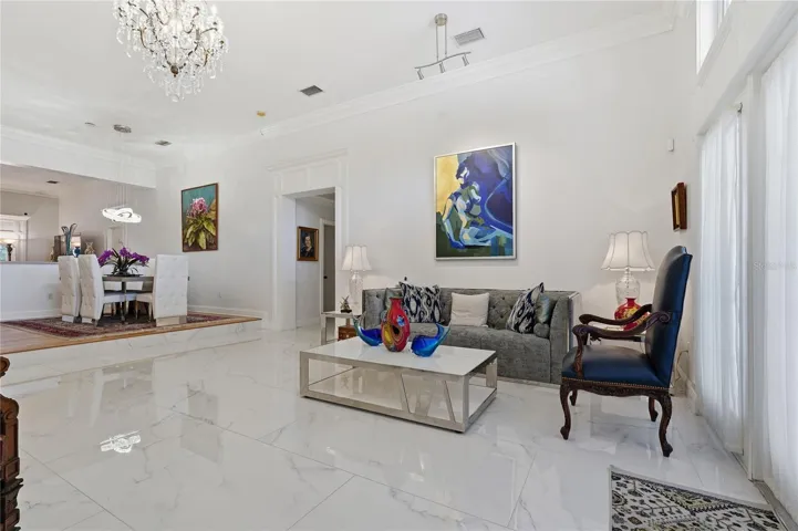 LIVING ROOM HAS 12' CEILINGS, 10" CROWN MOLDING WITH BEAUTIFUL WOODWORK