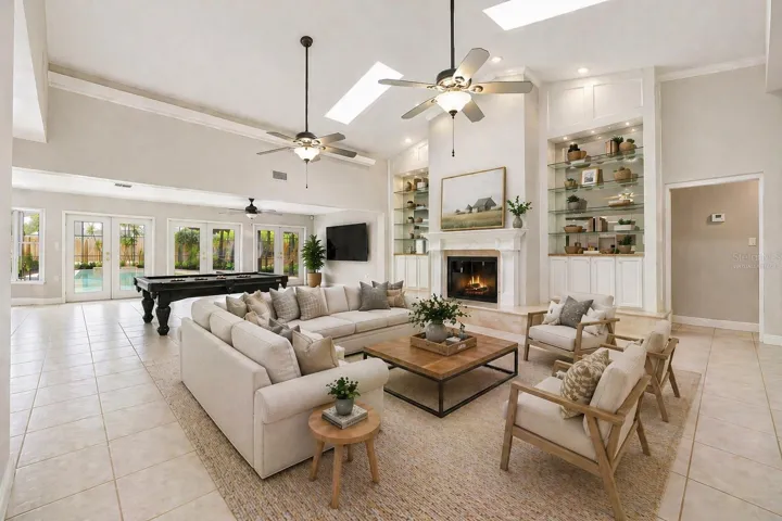 Virtually staged Family Room with walls changed to Virtual cream color to show what could be