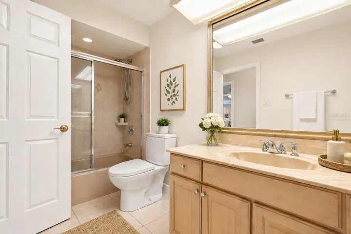 Virtually staged Hall Bath with Virtual cream walls