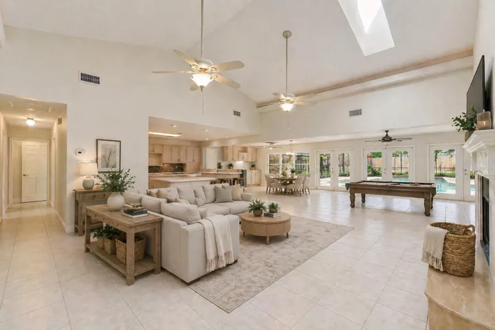 Virtually staged Family Room with walls virtual cream color