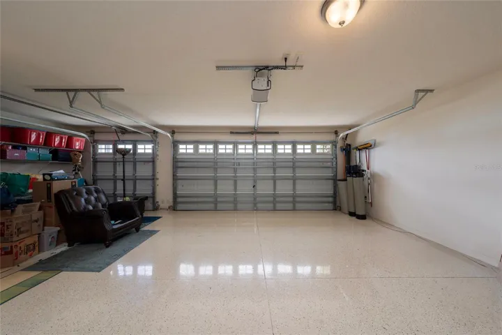 Golf cart garage space with epoxy floor