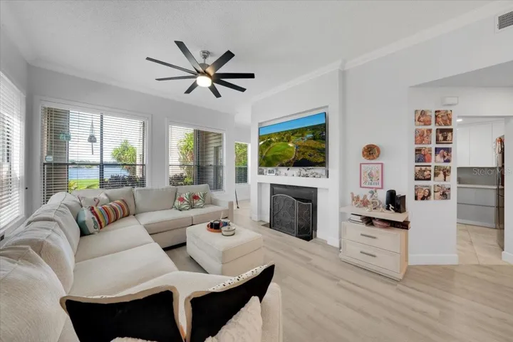HUGE Living Room through the front door entrance. Windows overlook the Lake!