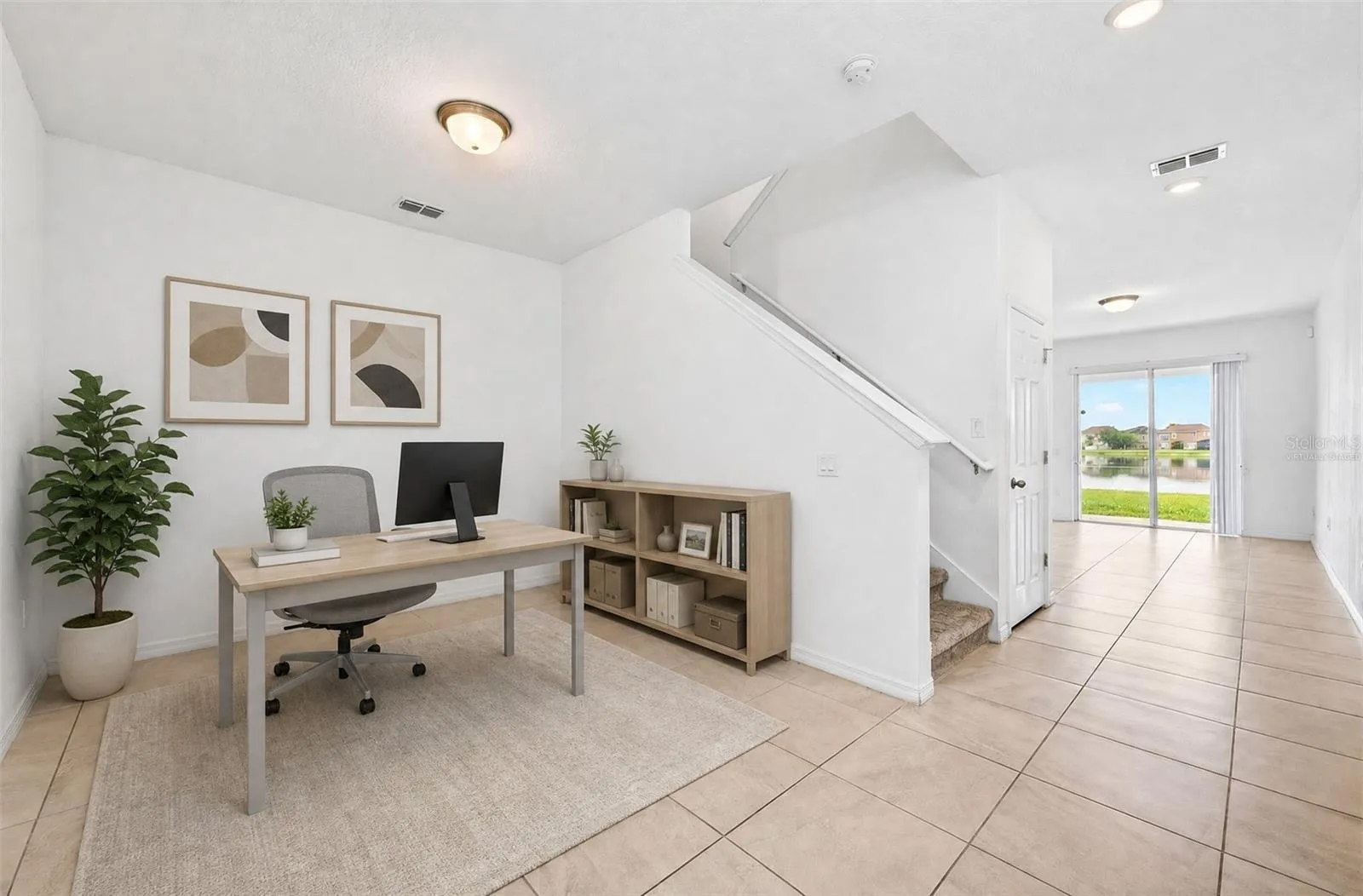 Versatile flex space at the front of the home makes a great home office, play space or additional living area!  Virtually Staged.