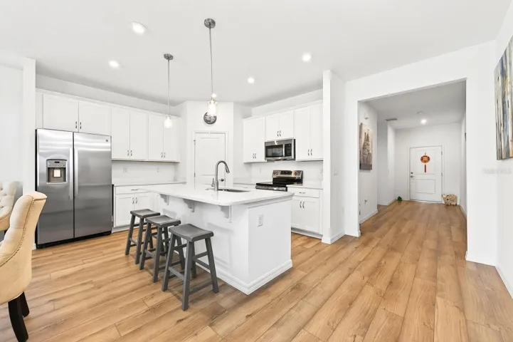 Over 2,000 sq ft of well designed living space anchored by LUXURY VINYL PLANK FLOORING throughout the main living areas and a fresh, neutral color palette.