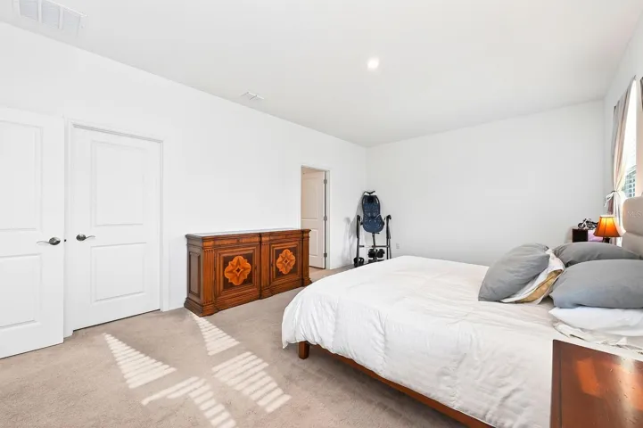 Light, bright primary suite becomes your tranquil retreat.