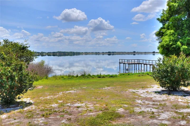 Out here, it all slows down—the yard, the light, and the lake settling in around you.