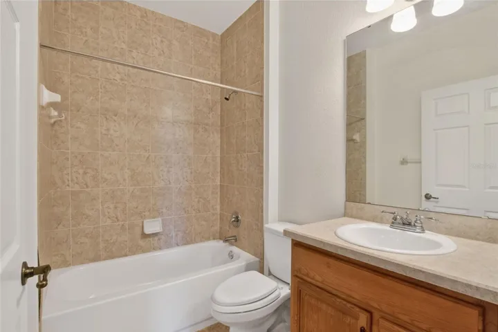 The second full bath sits just across the hall from the bedroom and main living areas, with natural light keeping the space bright and easy.