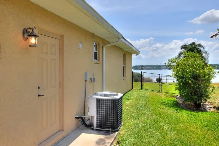 Side view of the house with side door garage access.