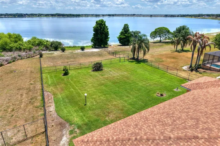 Out here, it all slows down—the yard, the light, and the lake settling in around you.