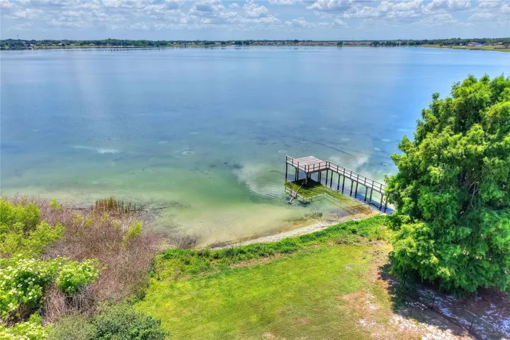 Out here, it all slows down—the yard, the light, and the lake settling in around you.