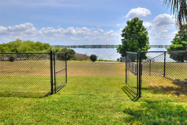 Out here, it all slows down—the yard, the light, and the lake settling in around you.