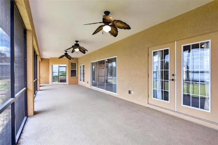 Every part of the home feels set around the lake, with views that stay with you from room to room.