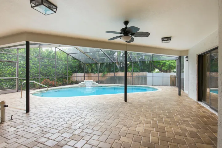 Freshly sealed paved pool deck