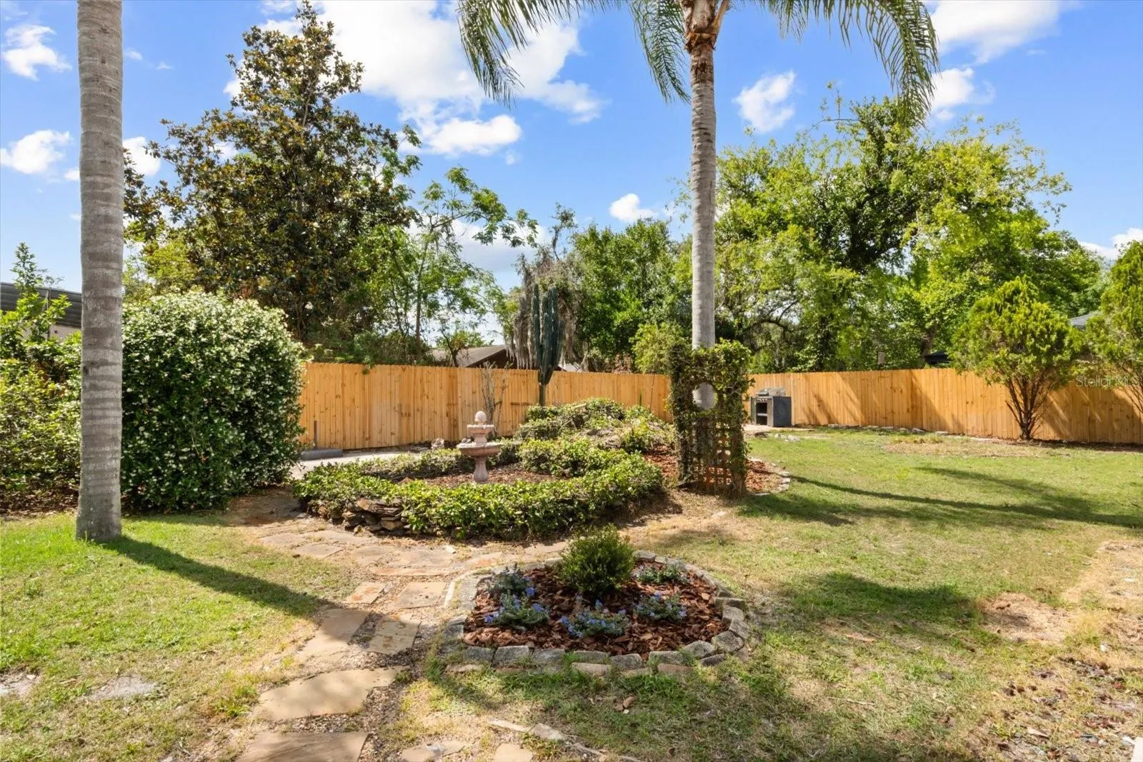 Large backyard for gardening and relaxing