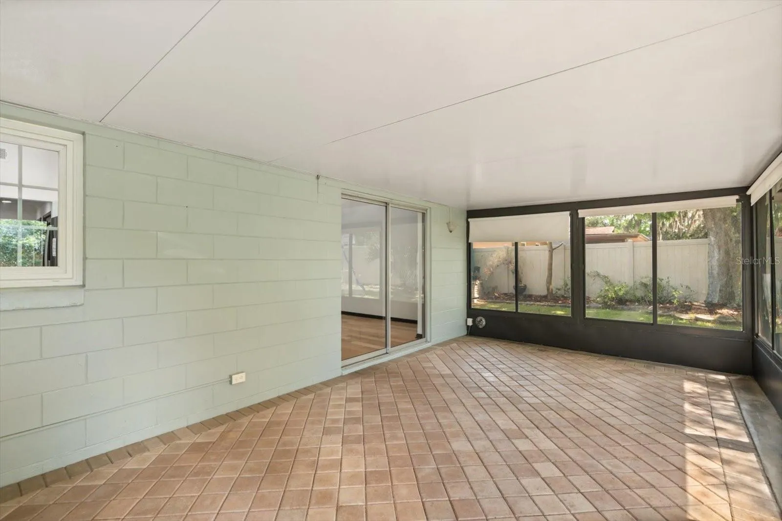 Enclosed lanai with brick pavers