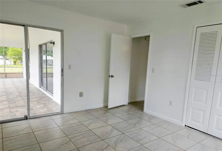 All bedrooms have sliding doors to the screened porch.