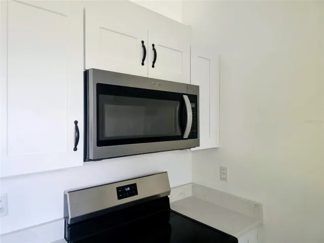 New microwave and stove.