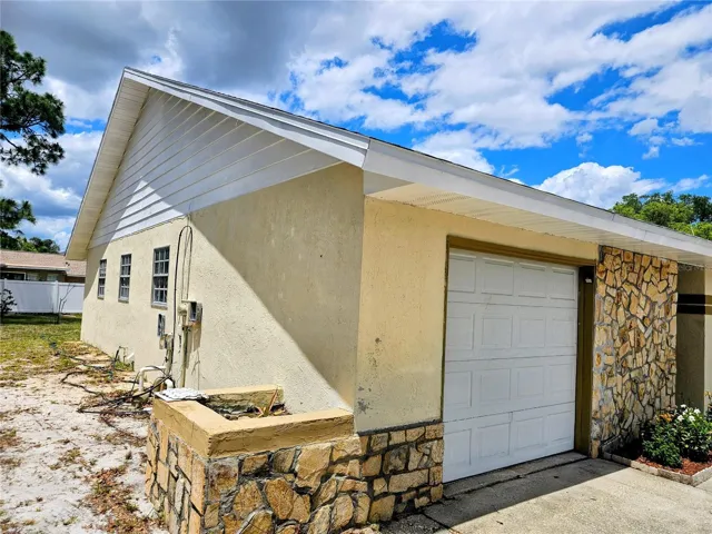 Stone accents in the front and side of the home.