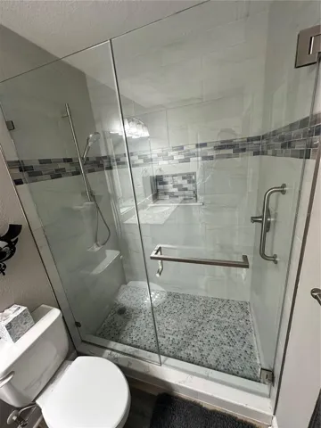 Hall Bathroom frameless glass shower door