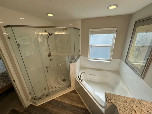 Primary Bathroom has separate garden tub and shower