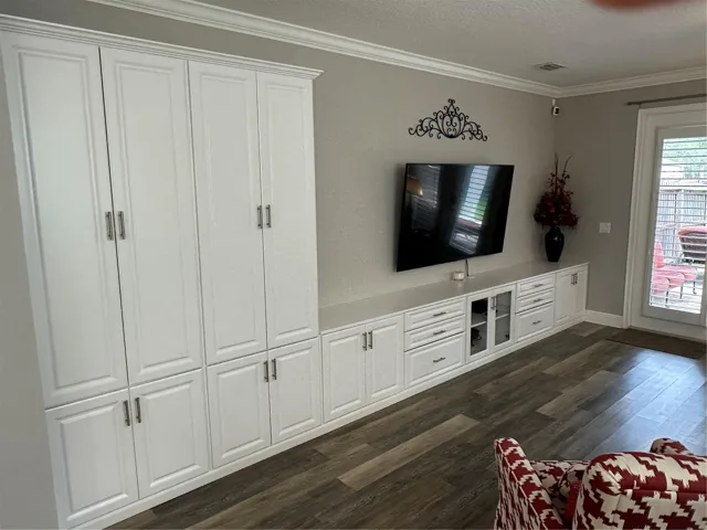 Great Room has console cabinets for storage