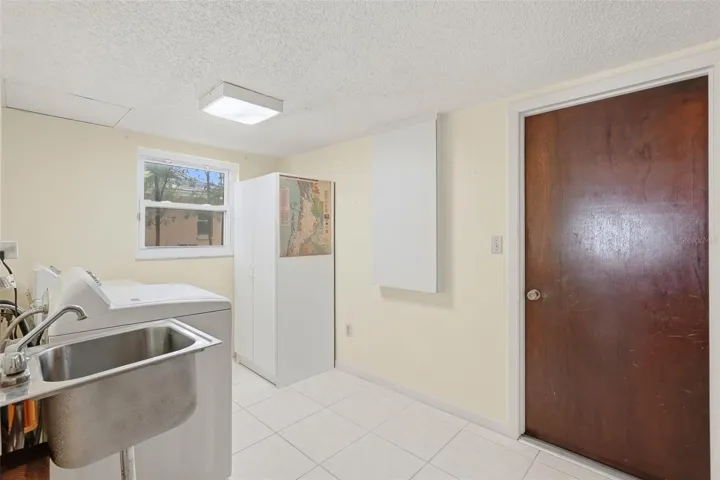Inside Laundry Room and door to the garage.