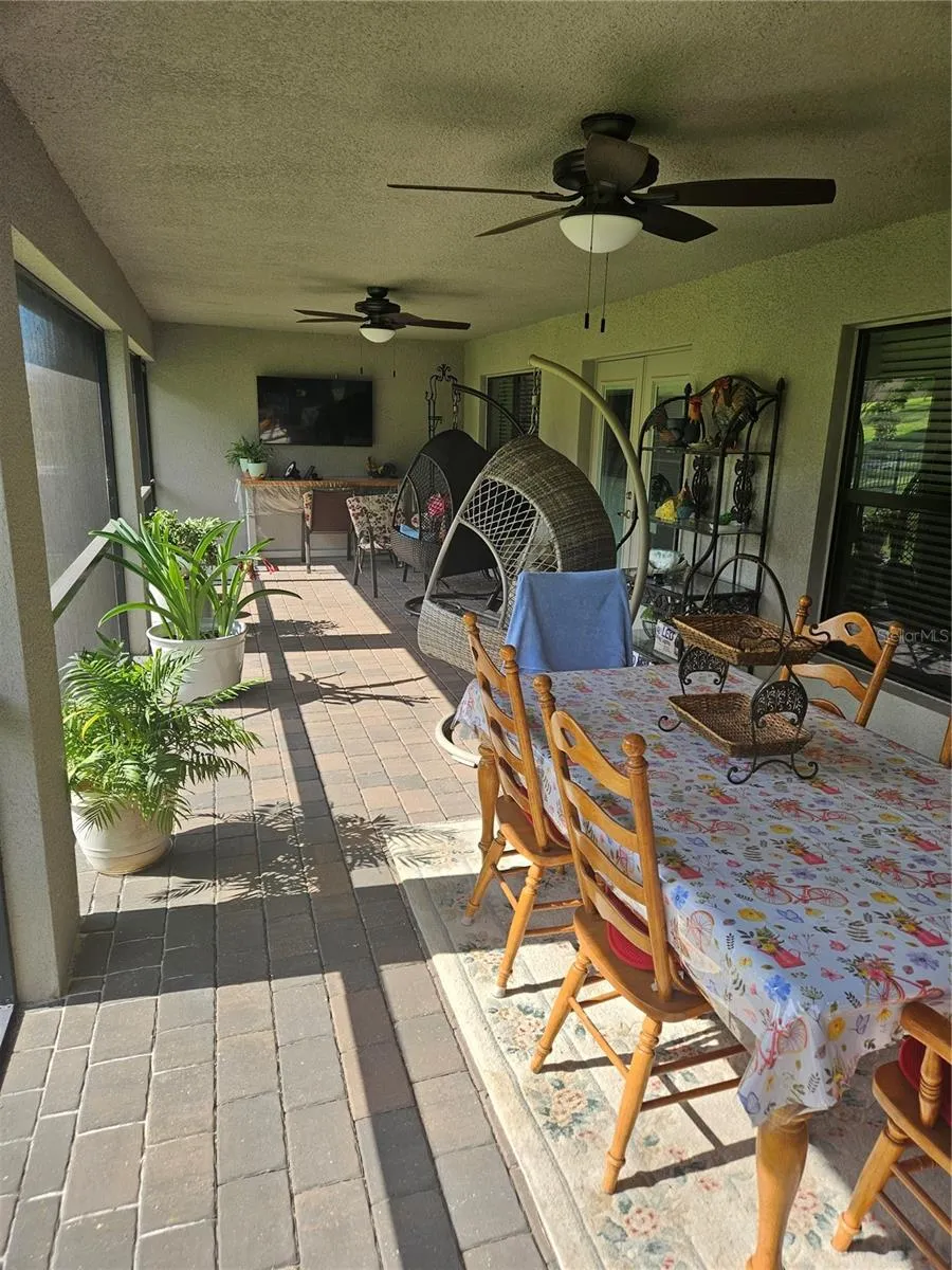 Lanai -11'x36' pavers, 55 " TV and two fans