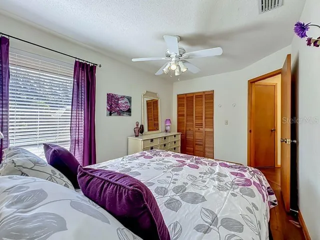 Second Bedroom: Large window for lighting- Engineered wood flooring