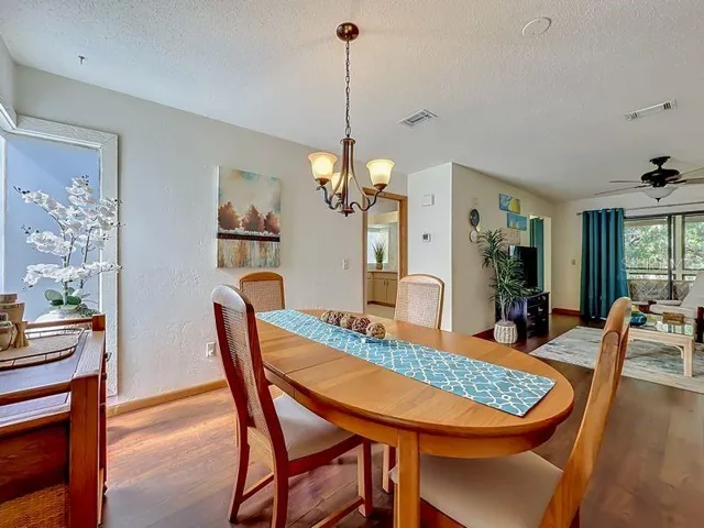 Dining Room view 2 toward Living room. Engineered wood flooring.