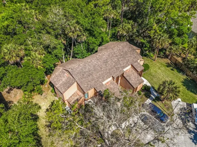 Arial view highlighting privacy of this unit's location within the complex