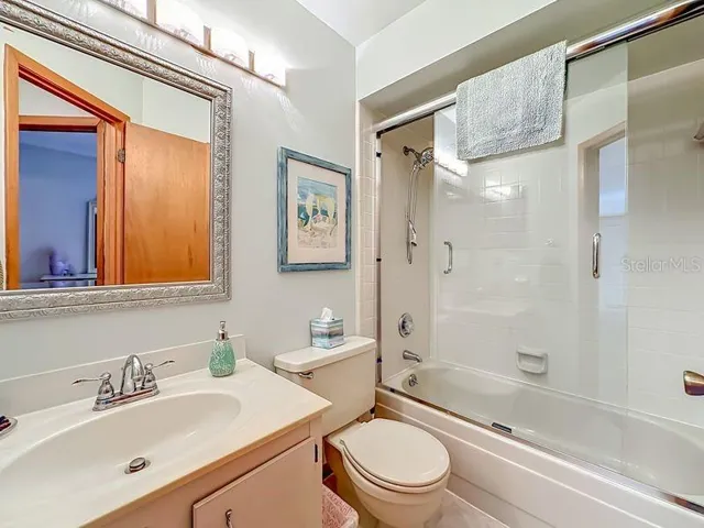 Second Bathroom: Tile Shower with Tub and glass enclosure