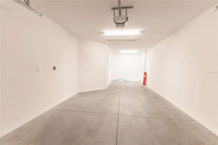 Garage has space for a car and golf cart