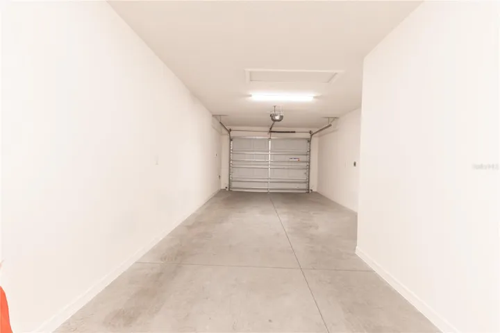 Garage has space for a car and golf cart