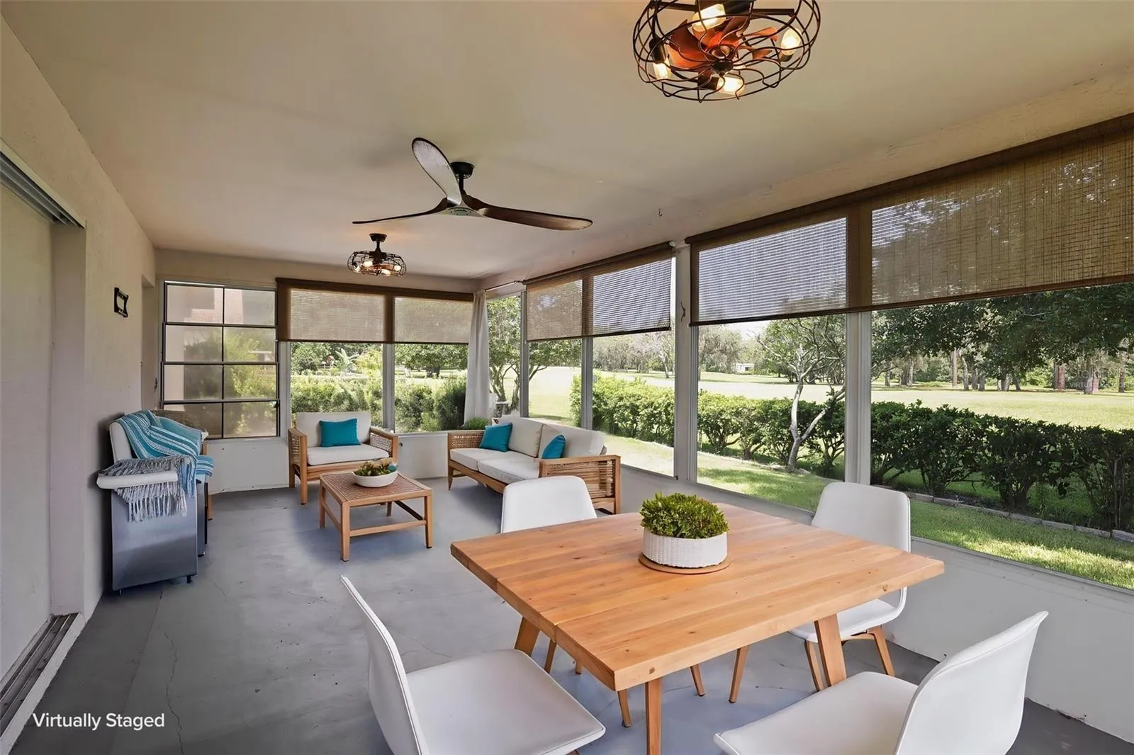 Virtually Staged Enclosed Rear Porch-Company entertainment space and enjoy Panaromic Golf course views.